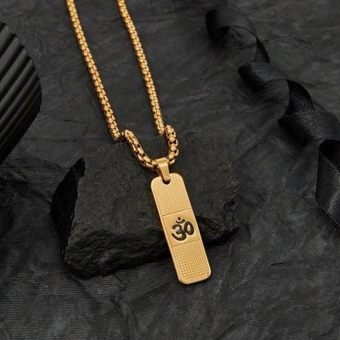 Devam 24K gold OM necklace featuring a textured pendant on a classic chain