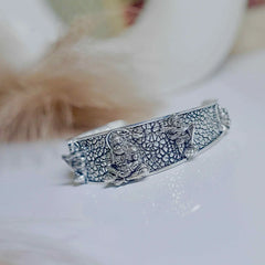 Devam Hanumanji kada bracelet with intricate silver design featuring Lord Hanuman