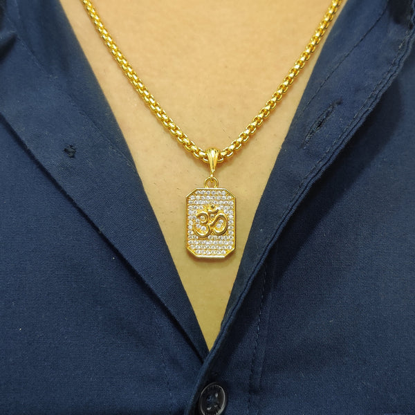 Elegant Om diamond pendant necklace on a gold chain, featuring intricate detailing and sparkling stones